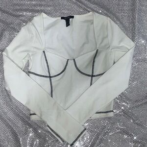 White long sleeve w/ black bustier stitch